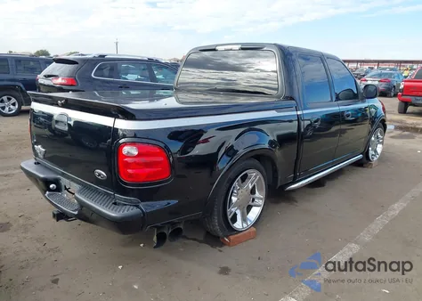 2003 Ford F-150 Lariat z USA, uszkodzony, nr VIN 1FTRW07323KC23526